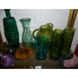 Assorted coloured glass vases, jugs and two agate bookends