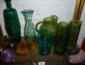 Assorted coloured glass vases, jugs and two agate bookends