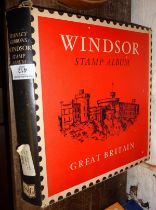 Large 1970s Windsor Stamp Album in box with some mounted stamp sets