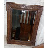 Wall mirror with carved oak frame