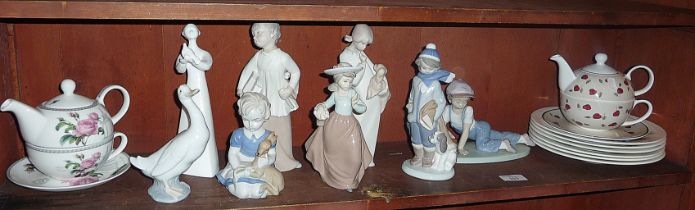 Collection of assorted Lladro type figurines and teapots