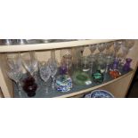 Collection of glasses, inc. paperweights and glass storage jars, etc.