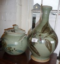 Studio pottery - a large glazed stoneware bottle vase, 14" high, and a stoneware lidded crock by