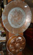 Victorian copper biscuit mould and a Persian tinned copper dish, 36cm diameter