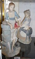 Nao porcelain figure of a woman at a spring and another of a girl with a goat