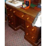 Victorian pitch pine kneehole desk of 7 drawers flanking a cupboard and having a mahogany top 4'