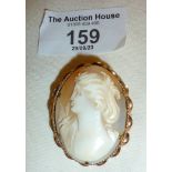 Shell cameo brooch in a 9ct gold frame, with pendant fitting, and approx. 4cm high, maker E.J.