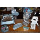 A vintage remote control K9 robot from BBC's Dr. Who, and two other robots