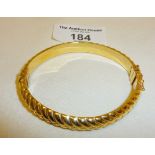 9ct gold hinged bangle bracelet, fully hallmarked, make SJ. Approx weight 10g.