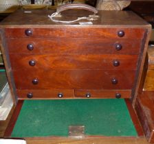 Old engineer's wooden case of graduated drawers with pull down front and carrying handle