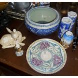 Poole Pottery plate, a Wade white rabbit, a blue and white ironstone jardiniere, two modern