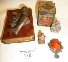 Equestrian paperweight, Crumpsall Crackers tin, carnelian, scent bottle and copper bishop figure