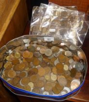 Tin of old coins, together with a tin of vintage buttons (in cupboard below)