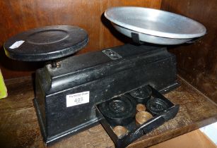 Old metal kitchen scales with weights inside integral drawer