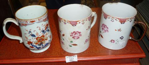 Two 18th c. Chinese Famille Rose tankards (A/F), and a Chinese Imari tankard, hairline crack