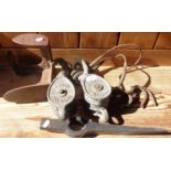 Pair of 5 inch iron pulleys by Ansells of Birmingham and a cobbler's last