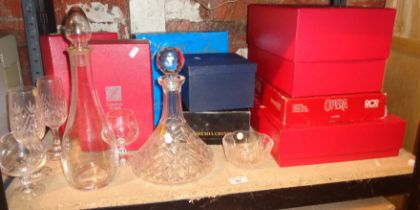 Assorted crystal glassware in boxes