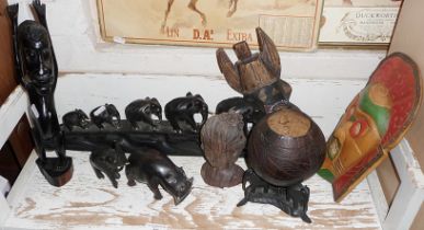 Carved ebony elephants and other tribal art figures