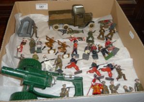 Britains Heavy Howitzer, a 6 wheel lorry, sentry box and 32 figures by Britains and others