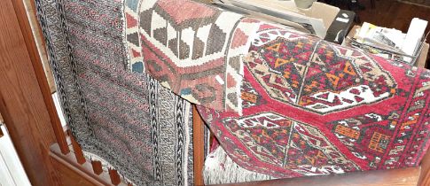 Caucasian prayer mat, a Persian runner and a scrap of Kelim rug fabric