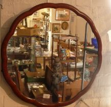 Walnut framed round wall mirror, 24" diameter