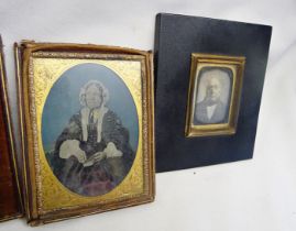 A 19th c. daguerreotype portrait of an elderly gentleman in ebonied frame and a 19th c. coloured tin