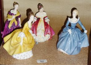 Four various Royal Doulton china figurines of ladies