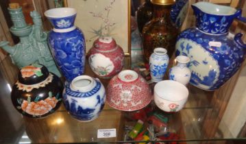 Three ginger jars and other pottery (one shelf)