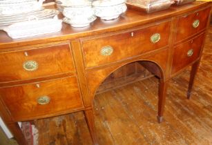 Edwardian Regency style bow fronted sideboard having central cutlery drawer flanked by two