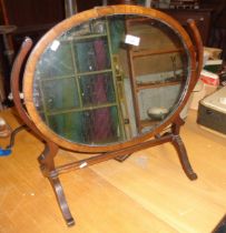 Oval mahogany framed toilet mirror