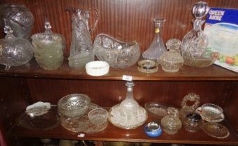 Two shelves of assorted cut glass