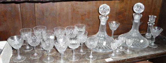 Two cut glass ship's decanters and a quantity of drinking glasses