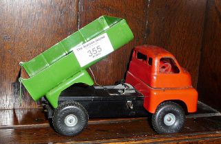 Vintage green and red Triang tinplate tipper lorry with two clockwork motors