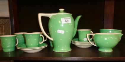 A Susie Cooper coffee set in green crescents pattern