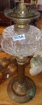 Victorian brass column oil lamp with glass reservoir (converted)