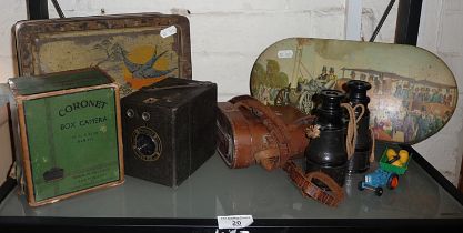 Coronet Box camera with original card box, old field glasses in leather case and two biscuit tins