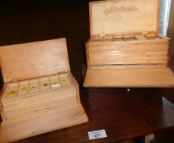 Two boxes of botanical microscope slides and an empty box