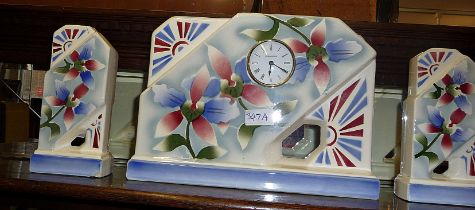 French Art Deco ceramic clock garniture with later movement