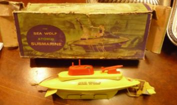 A Sutcliffe clockwork tinplate submarine called Sea Wolf with box, no key