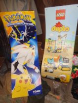 Advert shop display board for Pokemon and another for Lego Duplo