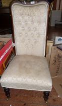 Victorian button back upholstered nursing chair with turned mahogany legs