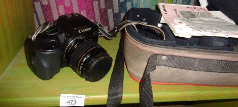 A Canon EOS 750 camera with case