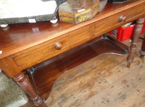 Victorian mahogany washstand with two drawers and shaped undertier