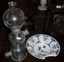 Spanish tin glazed barber's bowl (hairline crack) and a tall glass chemistry retort