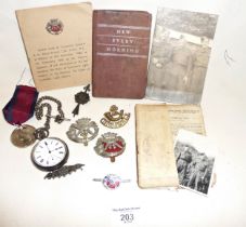 Silver pocket watch with plated fob chain, assorted cap badges, inc. Cornwall Regiment, a