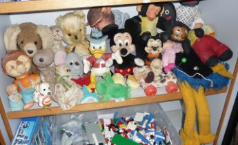 Large collection of assorted soft toys including Donald Duck, Mickey Mouse, Emu etc