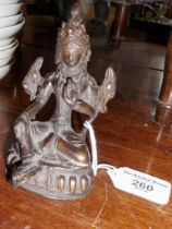 Bronze buddha with outstretched leg