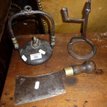 Unusual iron hanging spirit lamp, an early 18th c. wrought iron and rush nip and a steel chopper