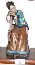 Painted figure of a pensive Chinese lady sitting on a Chinese red lacquer chair