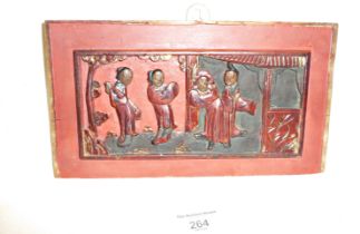 Chinese carved and lacquered panel with figures, 14cm x 24cm